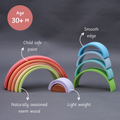 Rainbow stacker- Big features smooth edges, child-safe paint, lightweight design, and is made from naturally seasoned neem wood.