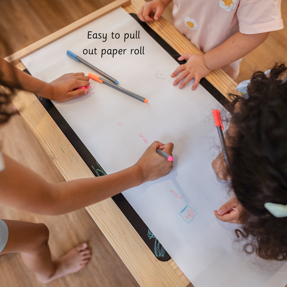 Sensory Table contains easy to pull out paper roll
