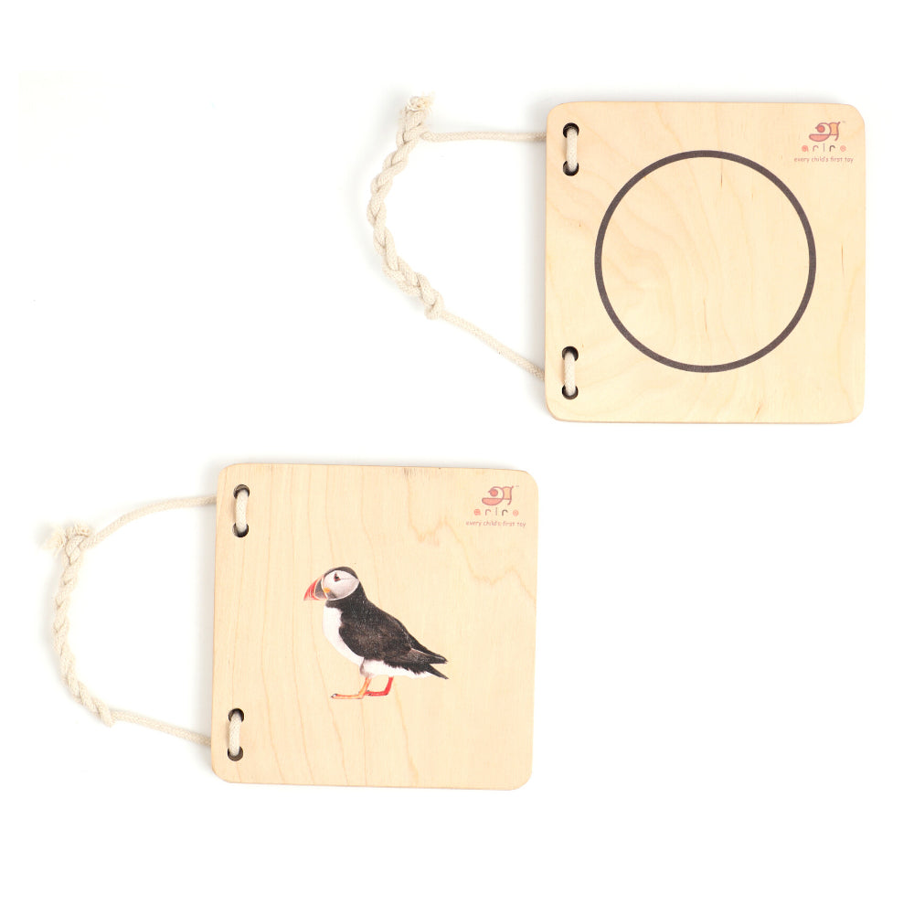 wooden puzzle book featuring a colorful puffin illustration that fits perfectly into a corresponding circular cutout, designed to enhance baby's problem-solving skills.