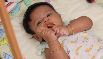 Baby Mouthing on a Teether 