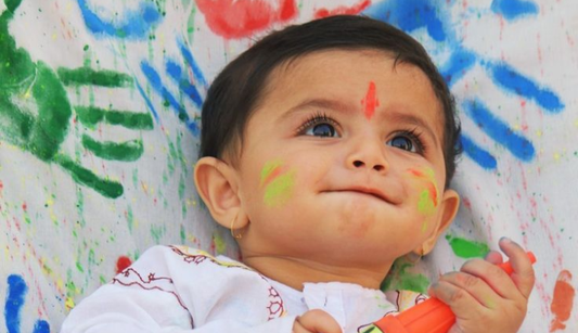 Child Celebrating Holi 