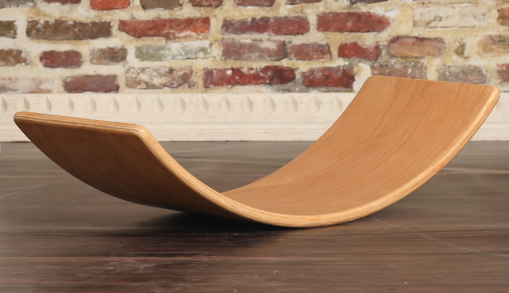 Lamination in a curved wooden balance board close-up