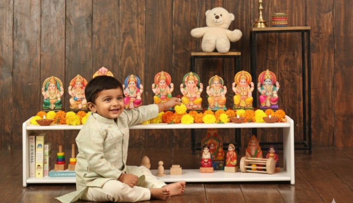 Child Decorating the Golu or pooja space 