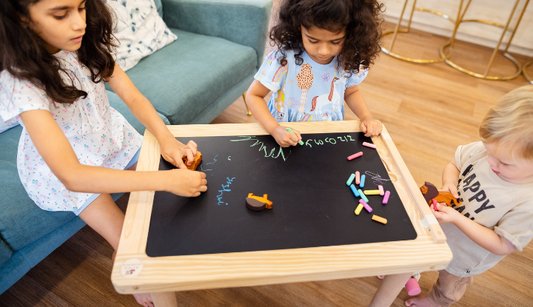 Children Engaging themselves with Wooden Sensory Table 