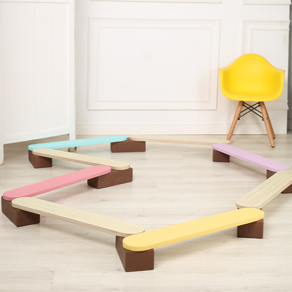 Ariro Montessori balancing beam for kids arranged in a circular shape supporting proprioception, coordination and balance development for children.