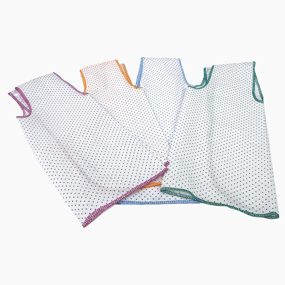 set of lightweight, mull cotton dresses with polka dots and colored borders Used for newborn as a part of a baby floor gym.