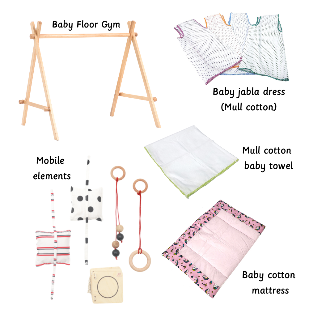 Baby Floor Gym and Essentials  , a wooden gym frame, mull cotton dresses and towel, and a cotton mattress Used for newborn and infant play, comfort, and care.