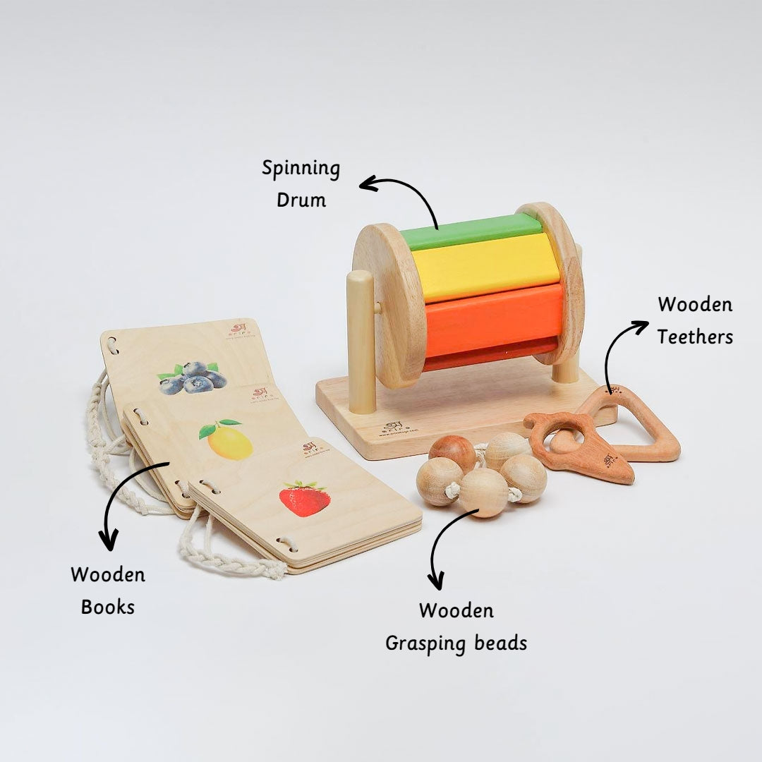 Montessori Kit contains spinning drum , wooden books , gasping beads and wooden teethers