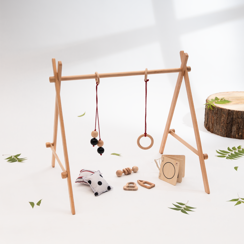 Neem Infant Starter Bundle crafted  for infants, complete with hanging sensory toys and tactile accessories to stimulate early motor and visual development.