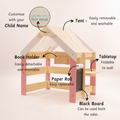 customizable kids' playhouse features a washable tent, foldable tabletop, reversible blackboard, movable book holder, replaceable paper roll, and name personalization—perfect for creative and educational play.