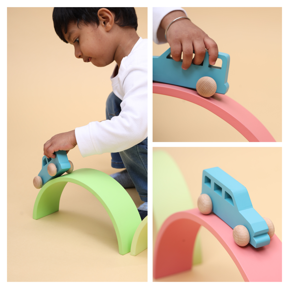 Rainbow stacker- Big designed for kids to play creatively by rolling the car over the arches, enhancing motor skills and imaginative play.





