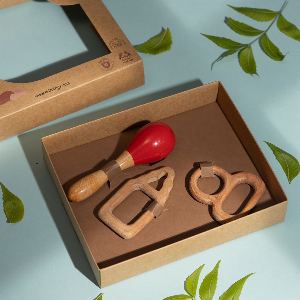 handcrafted wooden rattle and uniquely shaped teethers – designed for grasping, mouthing, and sensory play for babies