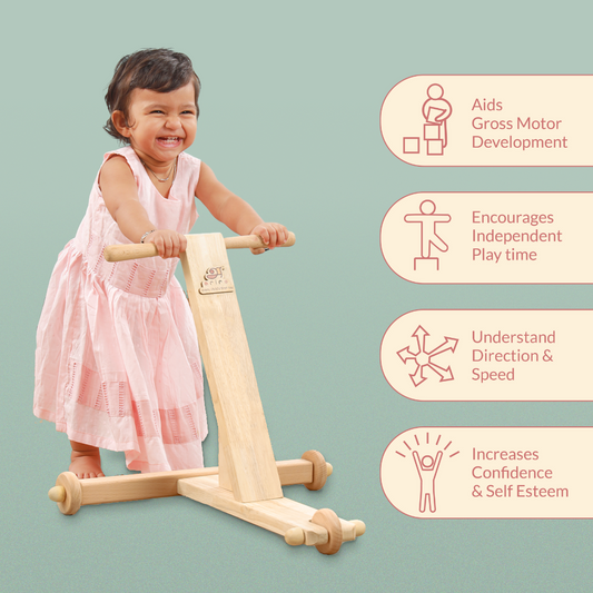 Wooden traditional push wagon used by a baby with the developmental features like gross motor development, independent walking, understanding speed and direction and increasing self confidence