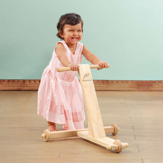 baby walking with the traditional opush wagon front view 