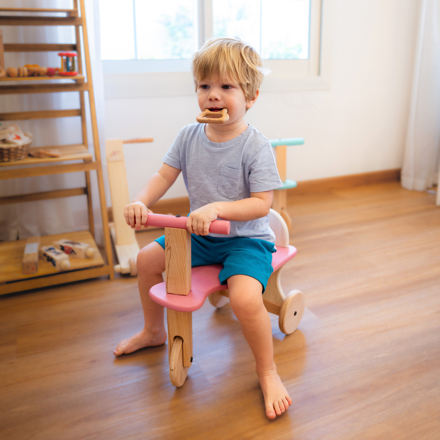 Handcrafted wooden Tuk Tuk designed for toddlers, offering smooth rides, perfect balance, and playful comfort.