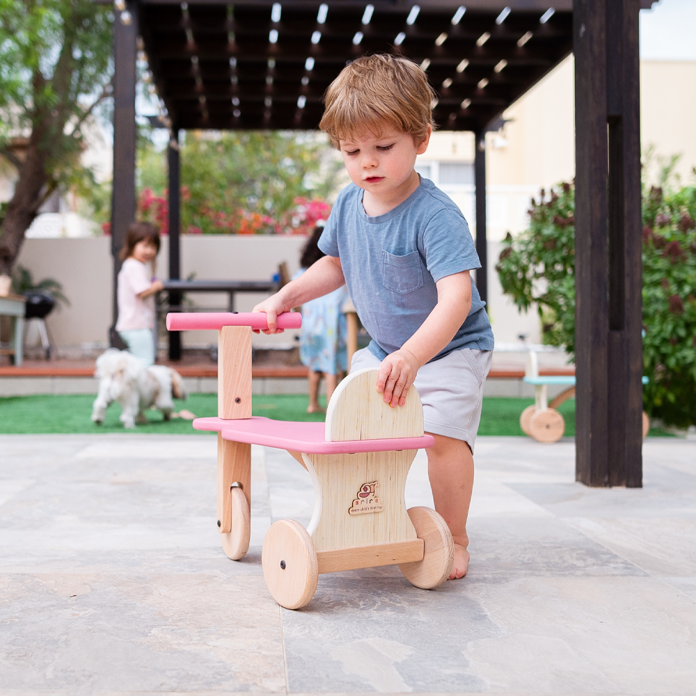 Sturdy, eco-friendly wooden Tuk Tuk perfect for toddlers’ outdoor and indoor adventures.