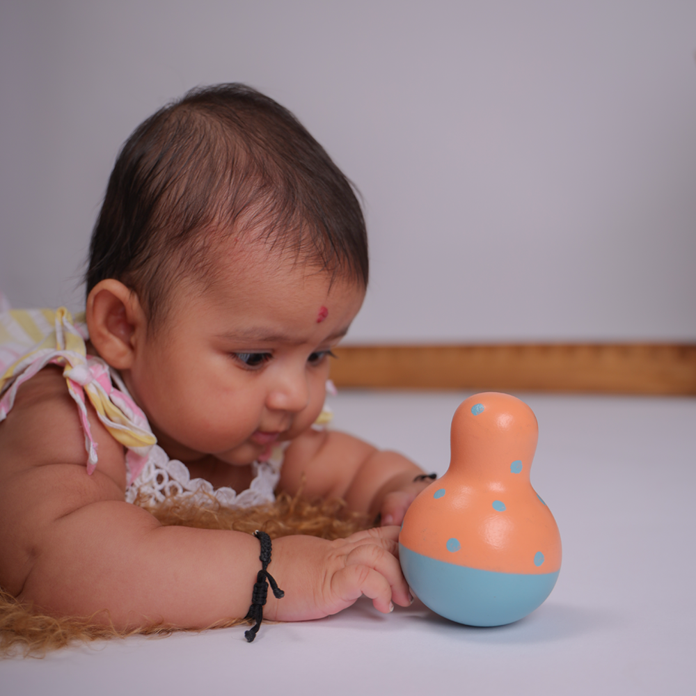Wobble Toy perfectly sized for infants, promoting curiosity and sensory development through safe, eco-friendly play.




