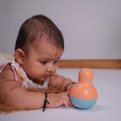 Wobble Toy perfectly sized for infants, promoting curiosity and sensory development through safe, eco-friendly play.




