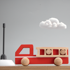 handcrafted wooden fire truck made with child-safe materials, designed to inspire imaginative play and motor skill development