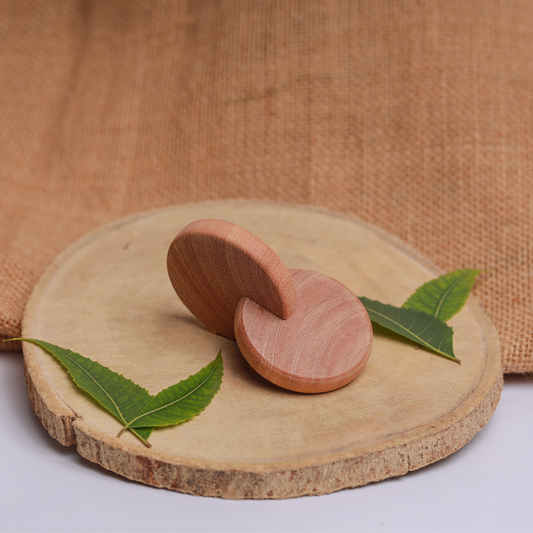 Wooden Interlocking Discs crafted for babies to promote sensory exploration, grip strength, and motor skill development.