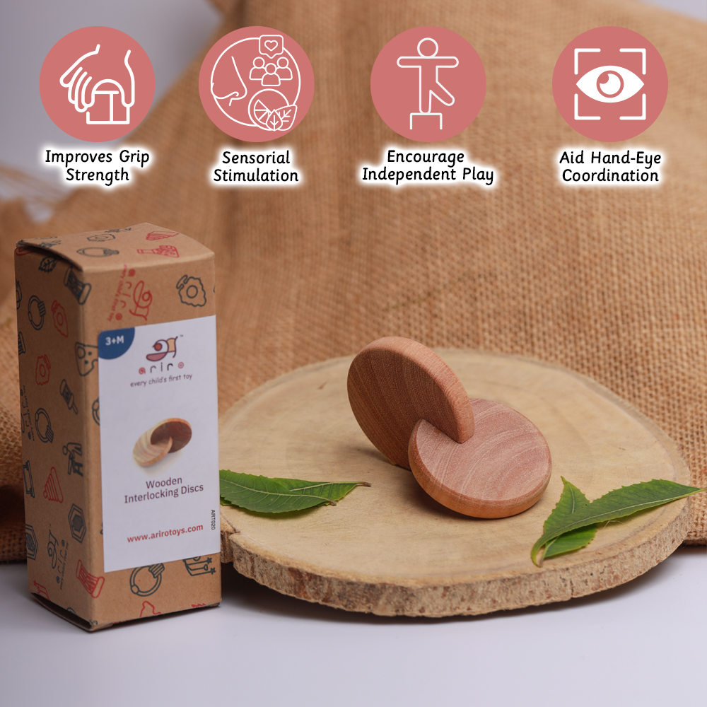 Wooden Interlocking Discs  designed to boost grip strength, sensory development, and hand-eye coordination for babies 3+ months.





