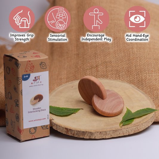 Wooden Interlocking Discs  designed to boost grip strength, sensory development, and hand-eye coordination for babies 3+ months.





