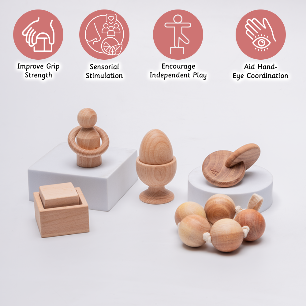 natural wood sensory toys for babies and toddlers – used to improve grip strength, encourage play, and develop motor skills.
