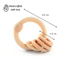 wooden rattle offers a perfect grip for little hands to explore safely and naturally.