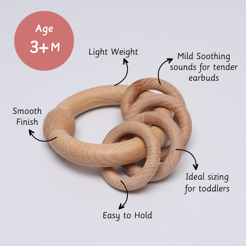 Perfect for babies 3 months and up, this lightweight wooden rattle is easy to hold, gently soothing, and crafted with a smooth, toddler-friendly finish.