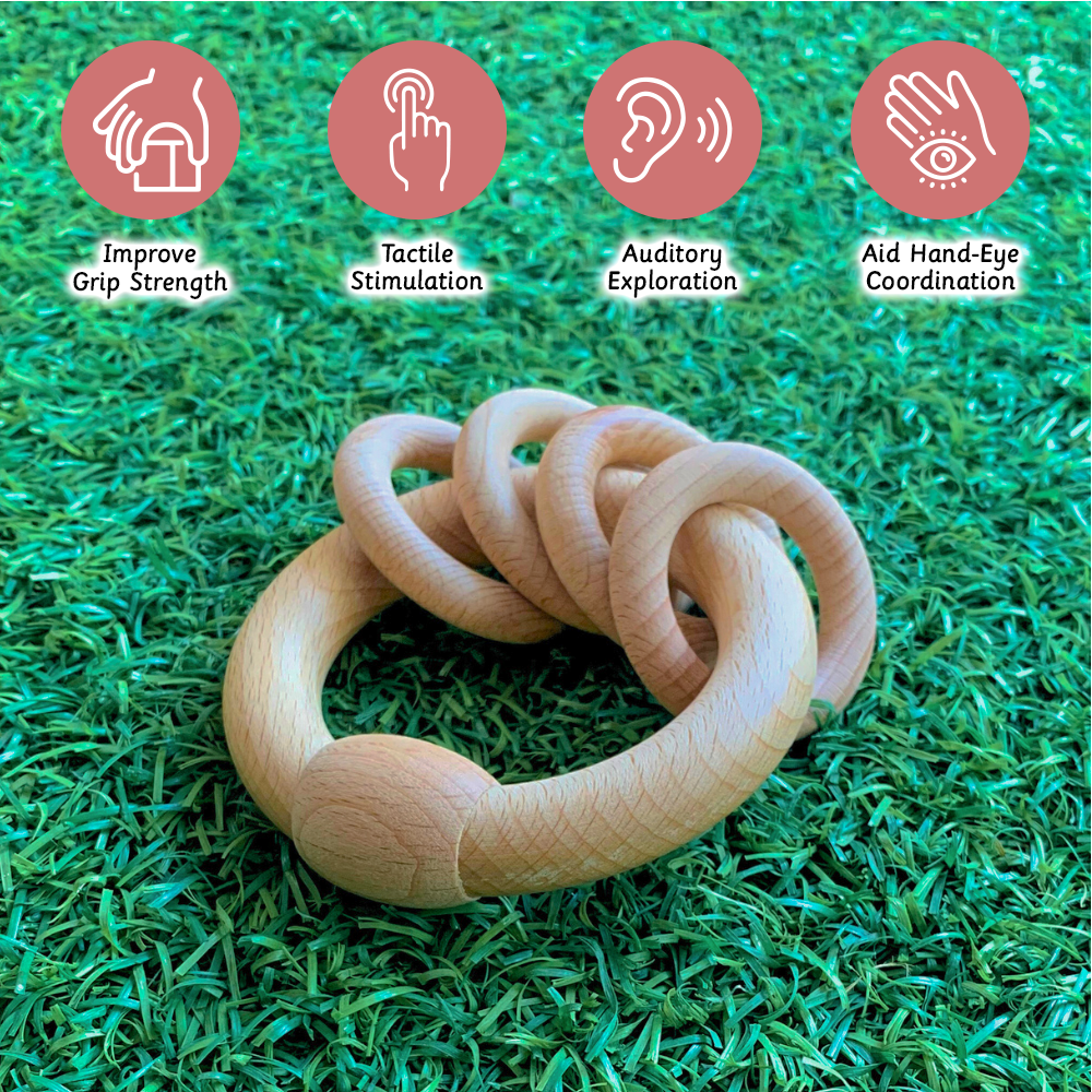 Encouraging sensory development, this wooden rattle boosts grip strength, hand-eye coordination, and auditory and tactile exploration.