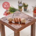 Wooden Rattle - Dumbbell with Rings  is easy to hold, sized for toddlers, and designed with smooth edges and soothing sounds for safe sensory play.