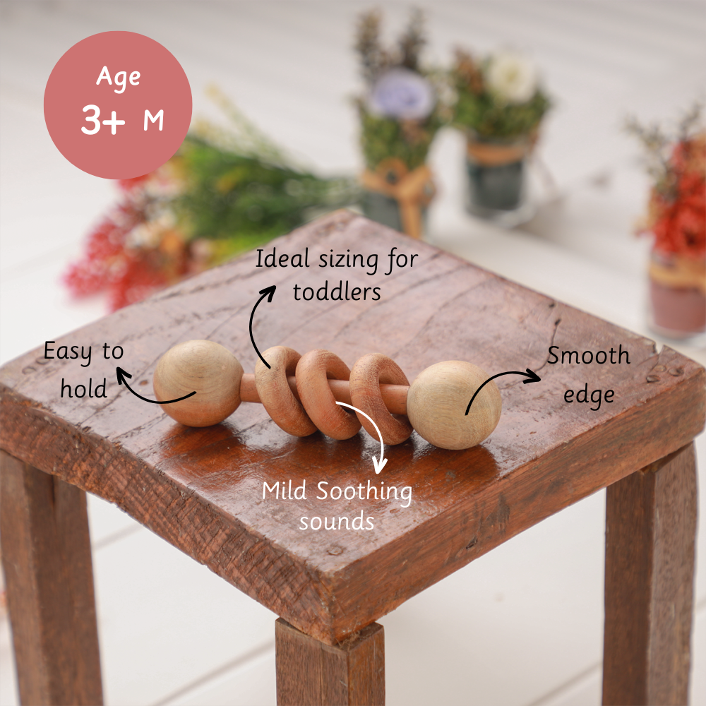 Wooden Rattle - Dumbbell with Rings  is easy to hold, sized for toddlers, and designed with smooth edges and soothing sounds for safe sensory play.