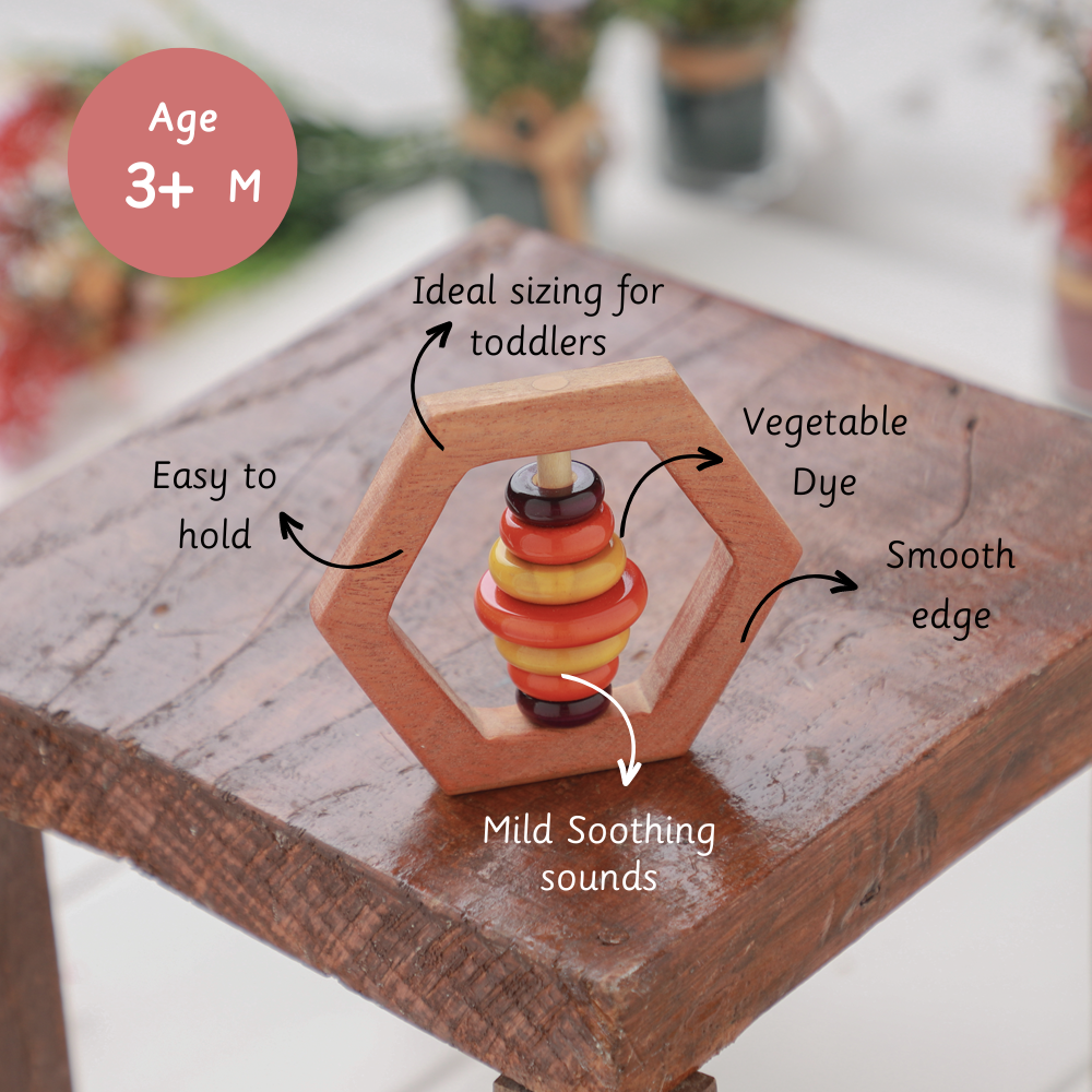 Wooden Rattle - Hexagon  is easy to hold, sized for toddlers, and designed with smooth edges and soothing sounds for safe sensory play.





