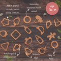neem wood teethers for babies aged 3 months and above, highlighting their natural, antifungal, antibacterial properties, smooth edges, and easy-to-hold designs.