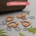 Wooden neem teethers with natural antibacterial and antifungal properties designed to boost immunity and prevent infections in babies.
