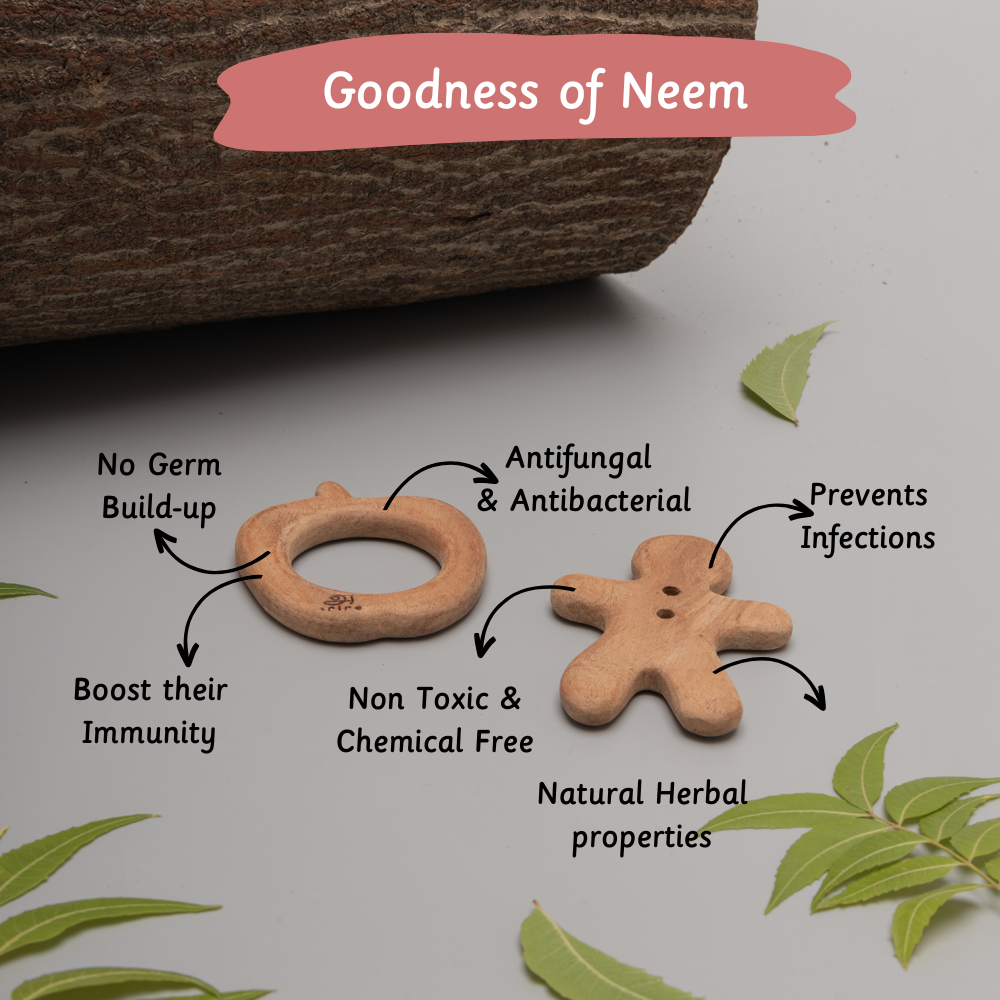 Two neem wood teethers are displayed with labels highlighting their natural benefits—non-toxic, chemical-free, antibacterial, antifungal, immunity-boosting, and infection-preventing properties