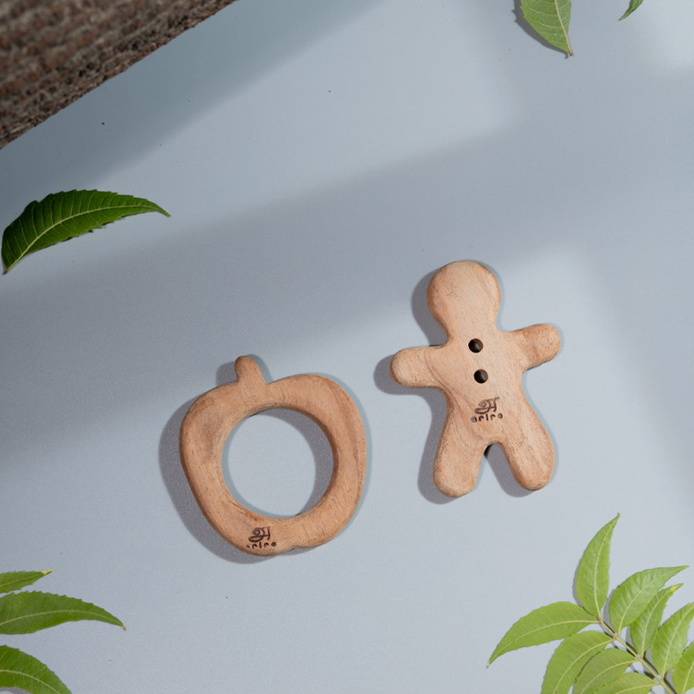 Wooden Teether – handcrafted natural wood teethers shaped as apple and gingerbread figure that are child safe