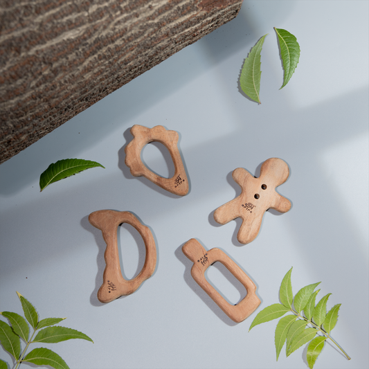 Wooden Teether Set – handcrafted natural wood teethers in fun shapes for safe and soothing infant play.