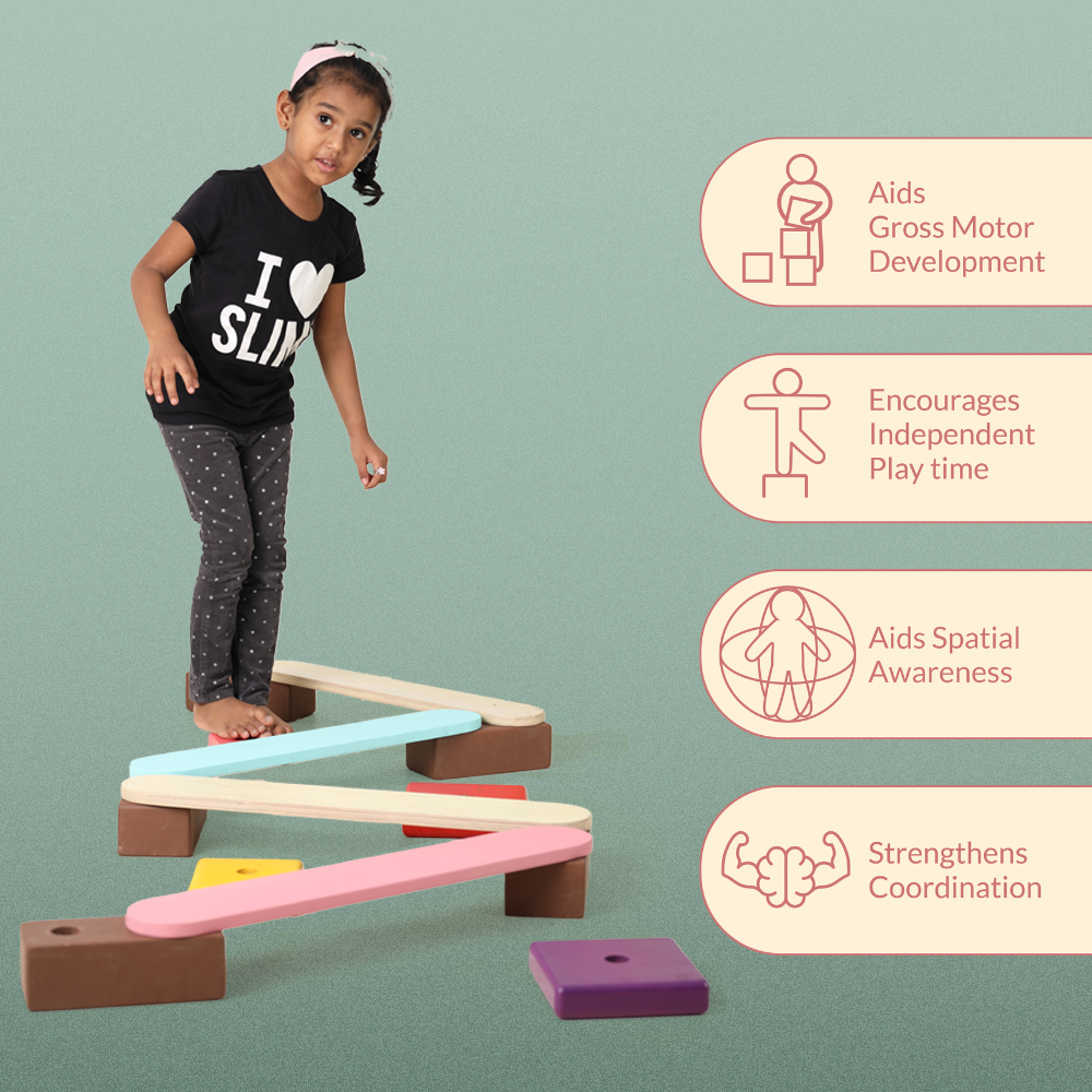 Child walking on Ariro wooden balancing beam for kids that supports balance training, gross motor development and independent play.