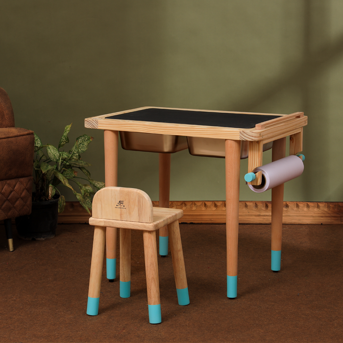 Ariro wooden Montessori sensory table with toddler stool, dual sensory bins and chalkboard activity surface designed for sensory play and creative learning for children.