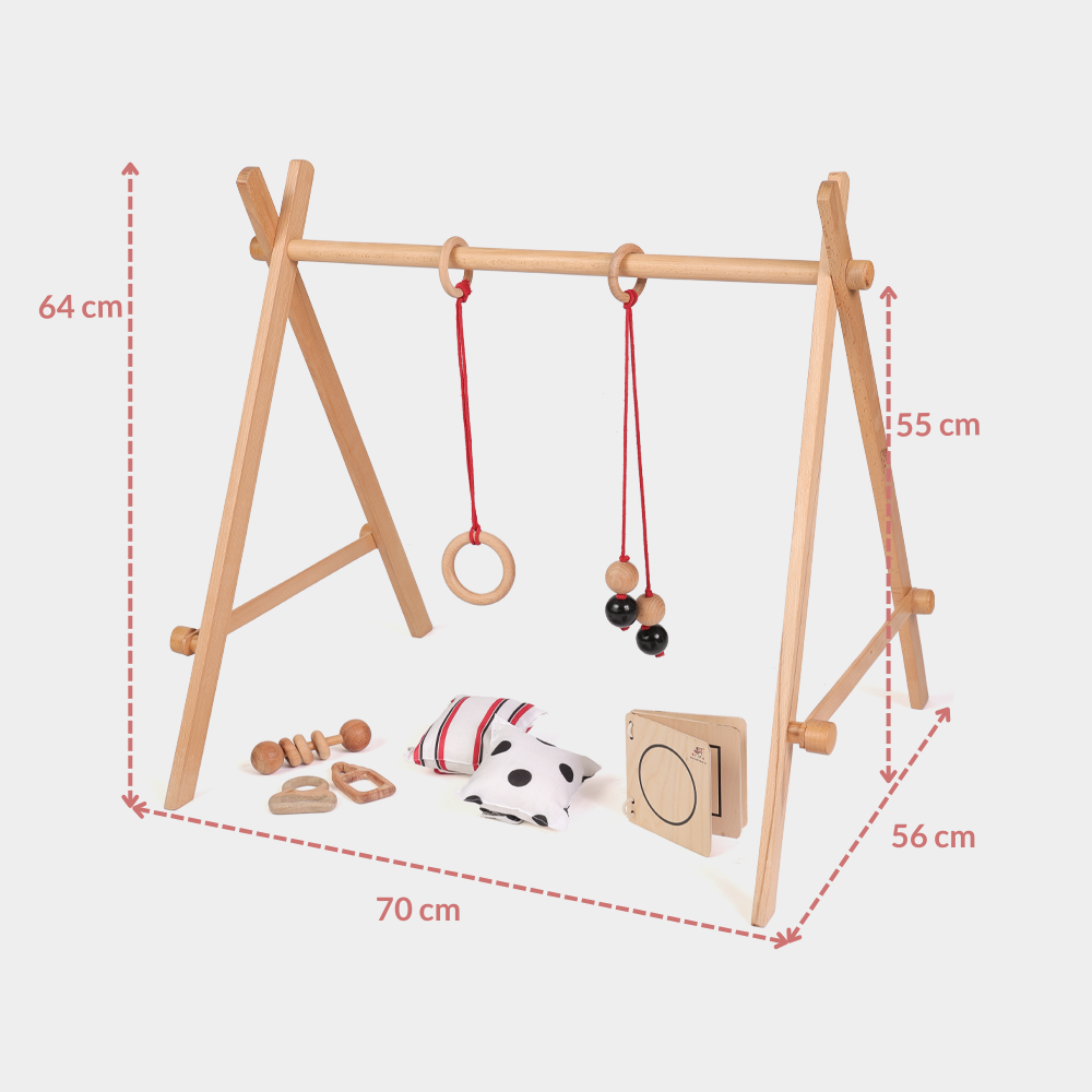 Dimensions of Ariro wooden Montessori baby floor gym showing height, width and base measurements designed for infant gross motor development and visual play