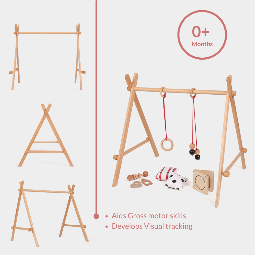 Ariro wooden baby floor gym for infants 0 months and above designed to support gross motor development and visual tracking with hanging Montessori toys