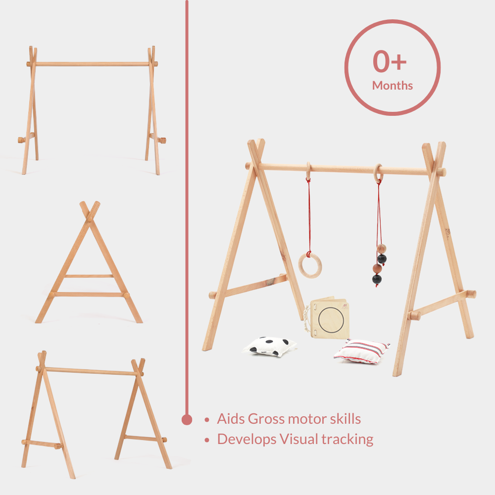Ariro wooden Montessori baby floor gym for newborns designed to support gross motor development and visual tracking with hanging visual and tactile toys ideal for newborns 