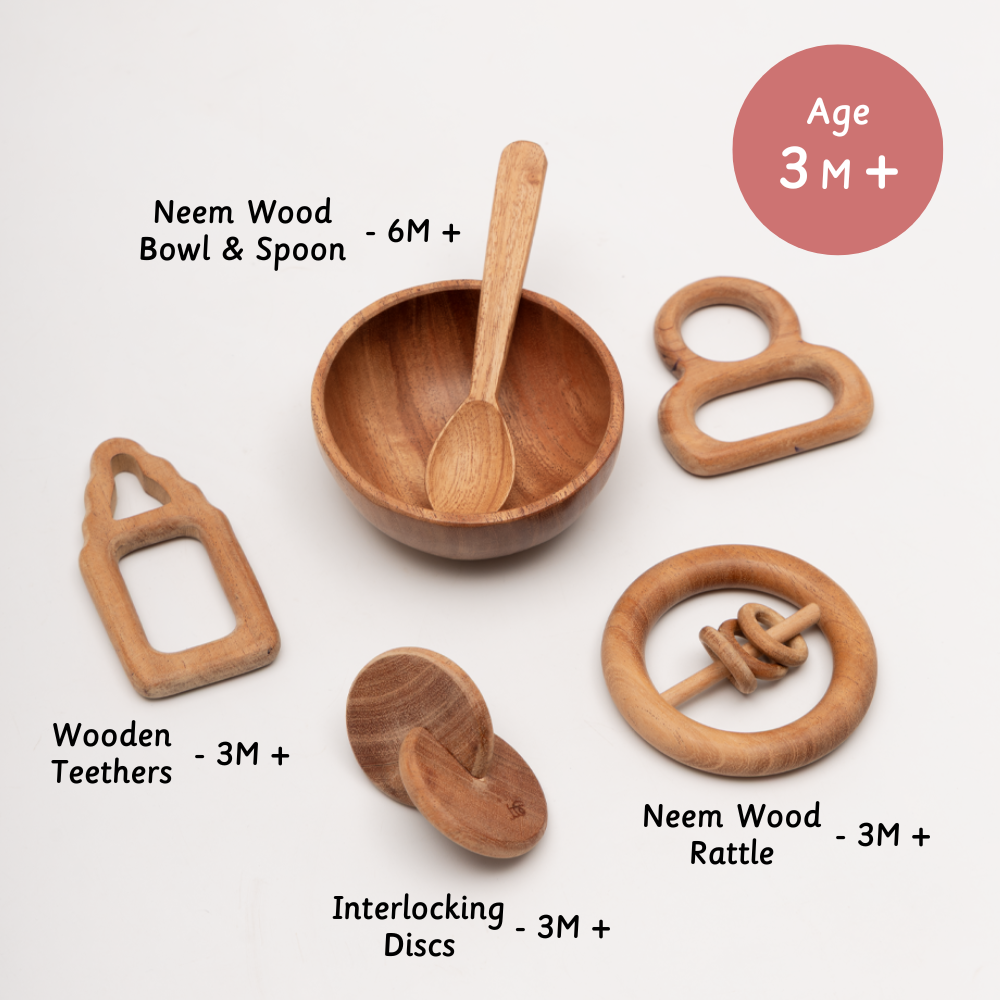 neem nurture kit contains wooden teethers , interlocking discs , rattles , wooden bowl and spoon 