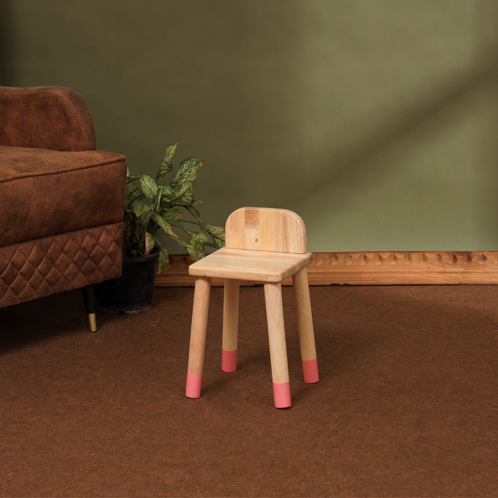 pink wooden stool long shot